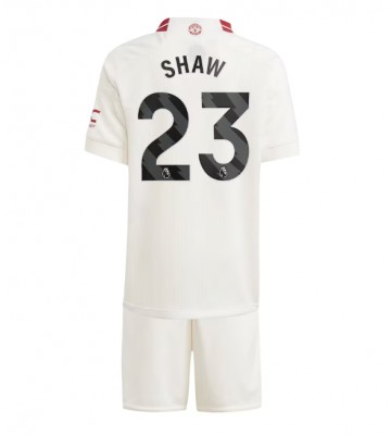 Manchester United Luke Shaw #23 Tercera Equipación Niños 2023-24 Manga Corta (+ Pantalones cortos)